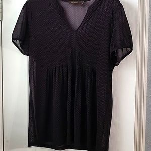 Thin see through blouse with red polka dots.